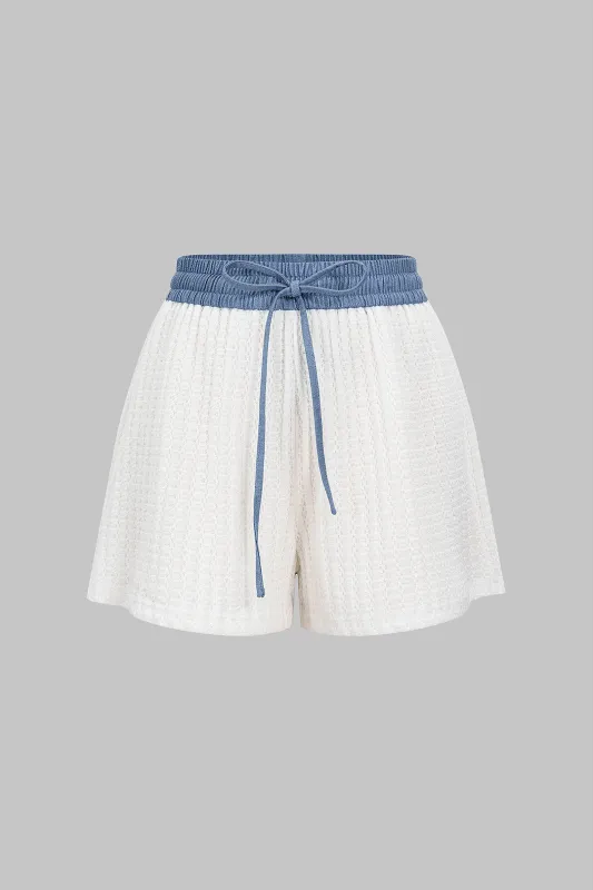 Tie front patchwork shorts sold by Micas