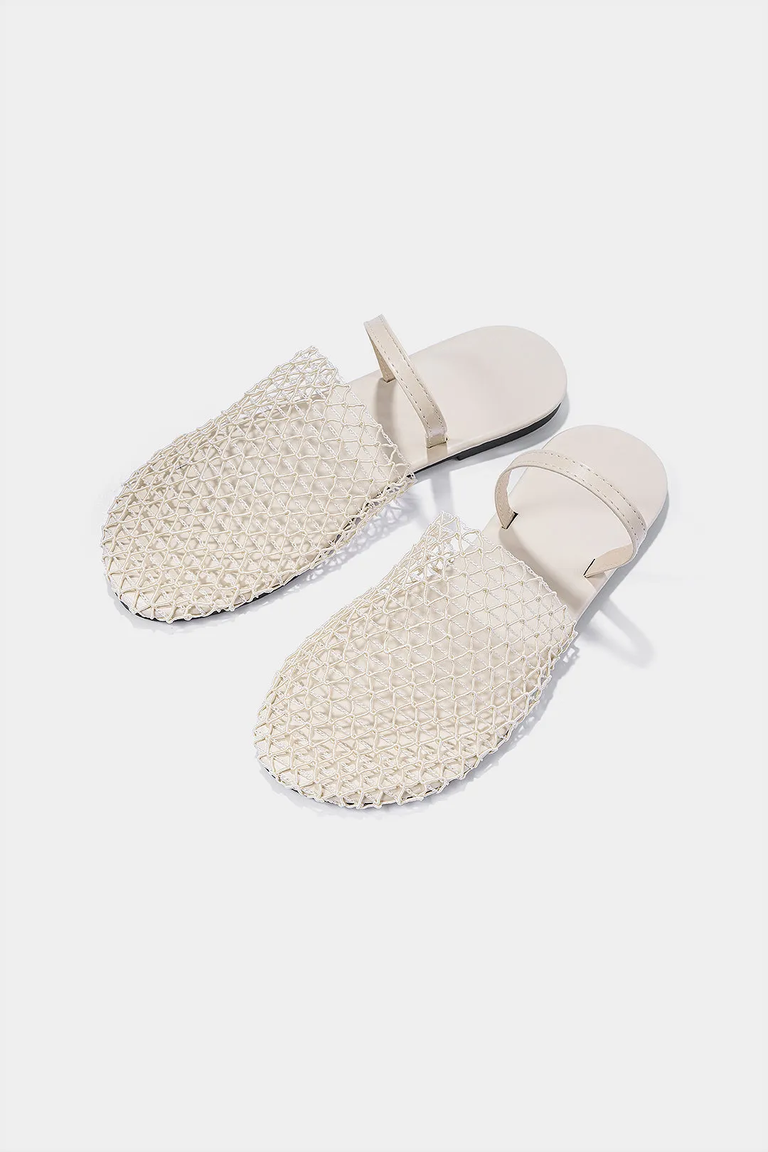 Woven Cut Out Round Flats sold by Micas