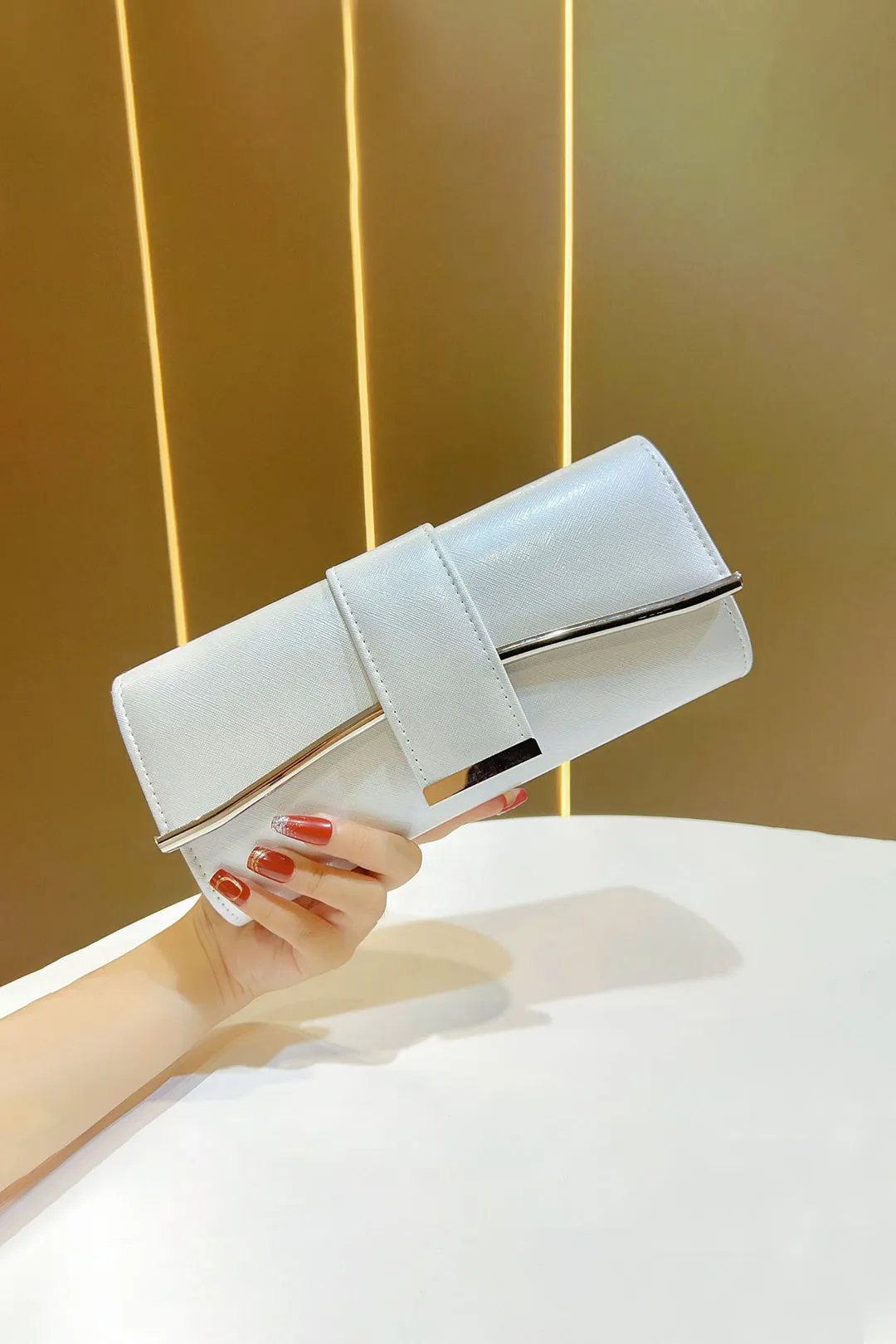 Faux Leather Clutch Bag sold by Micas