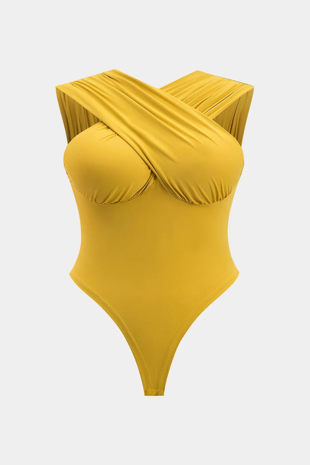 Plus størrelse ærmeløs krydset bodysuit sold by Micas