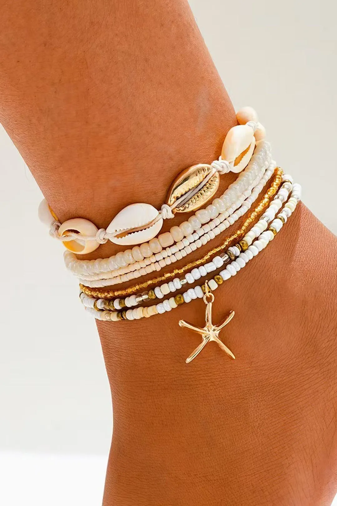 Pearl Shell Ankel sold by Micas