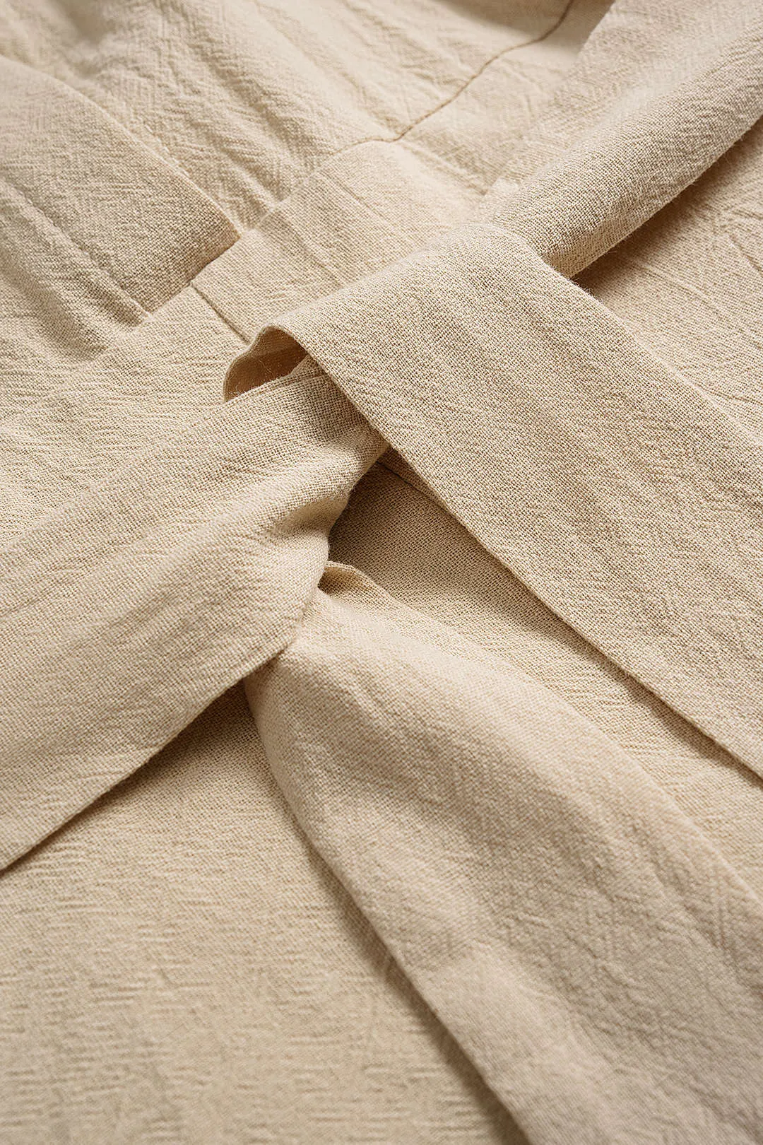 Solid Belted Short-Sleeve Romper sold by Micas product image thumbnail 3