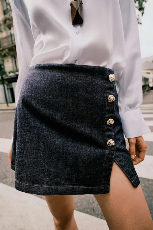Denim Asymmetrical Button Mini Skirt sold by Micas