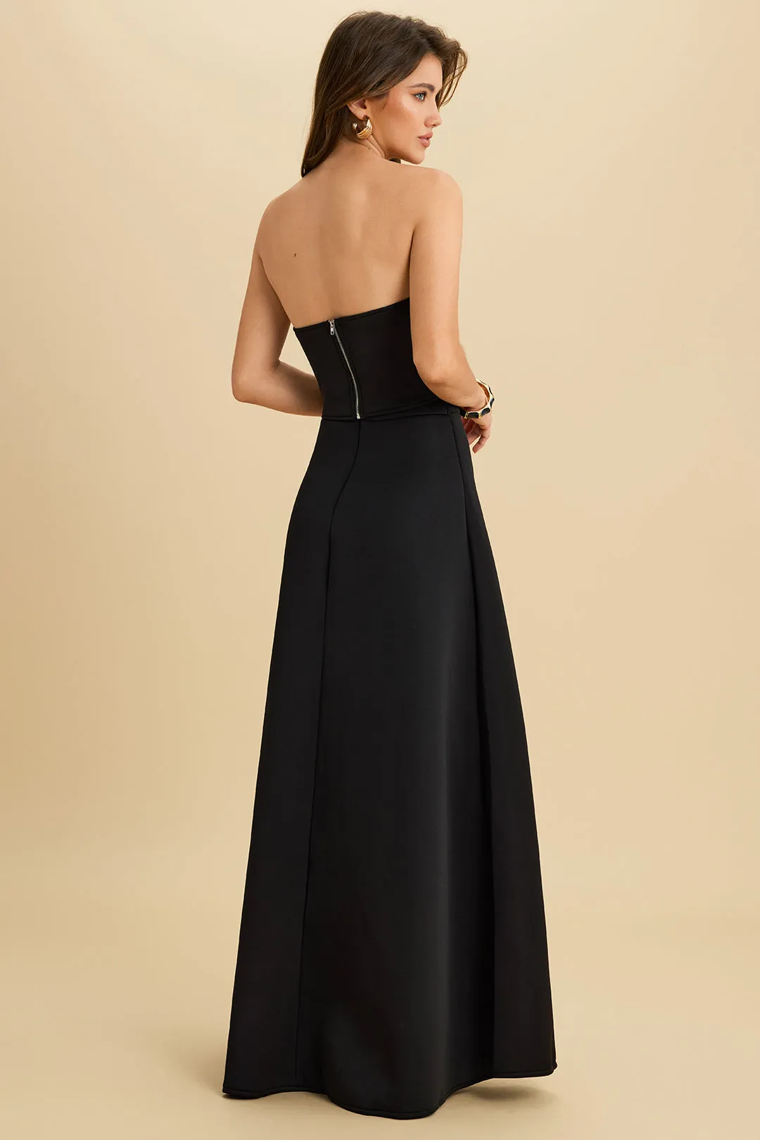 Asymmetrical Metallic Button Wrap Tube Top And High Waist Zipper Skirt Set sold by Micas product image thumbnail 2