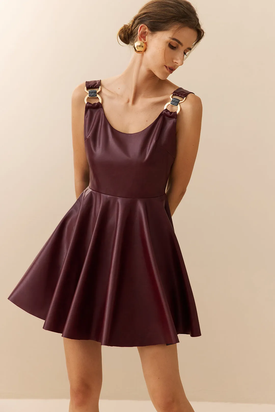 Faux Leather Asymmetrical Ruched Sleeveless Mini Dress sold by Micas