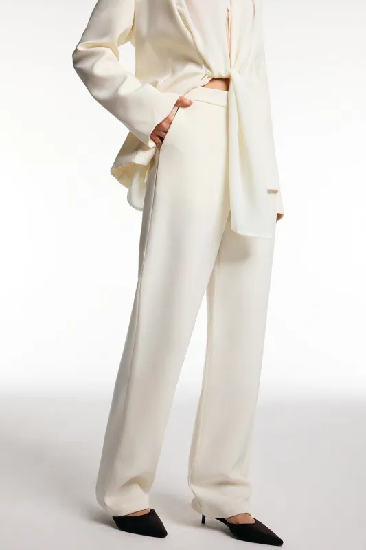 Solid Pocket Straight Leg Trousers sold by Micas