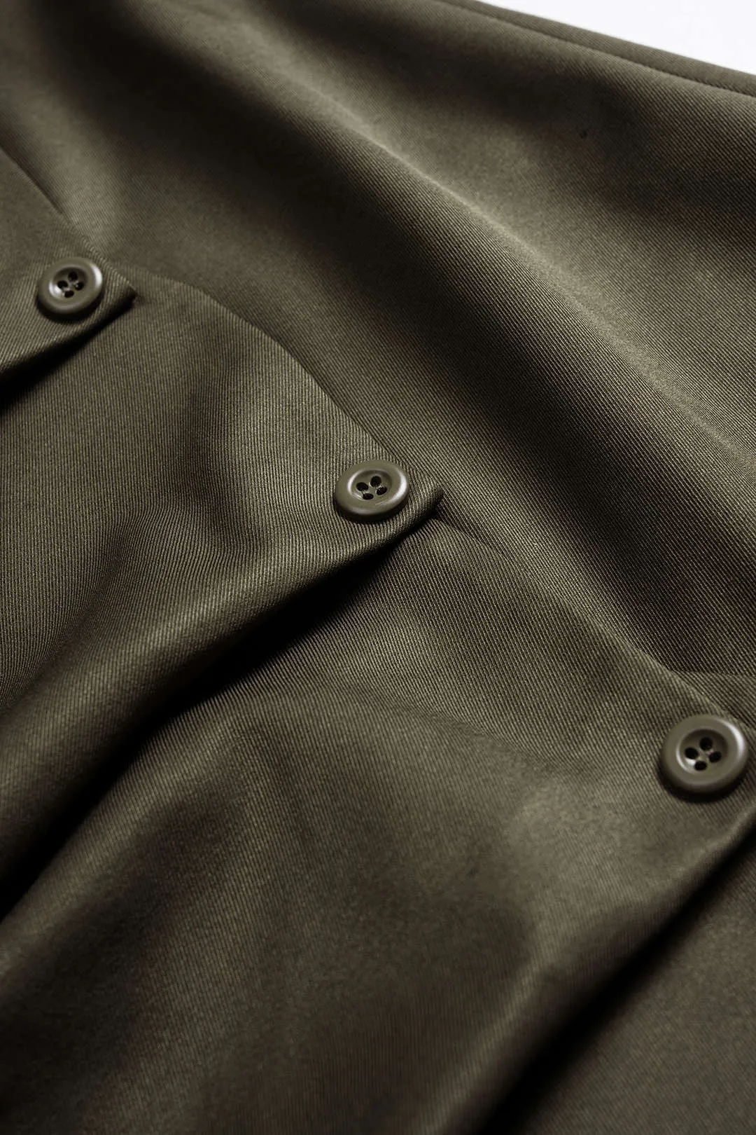 Asymmetrical Neck Long-Sleeve Top And Button Pleated Zipper Low Waist Skirt Set sold by Micas product image thumbnail 4