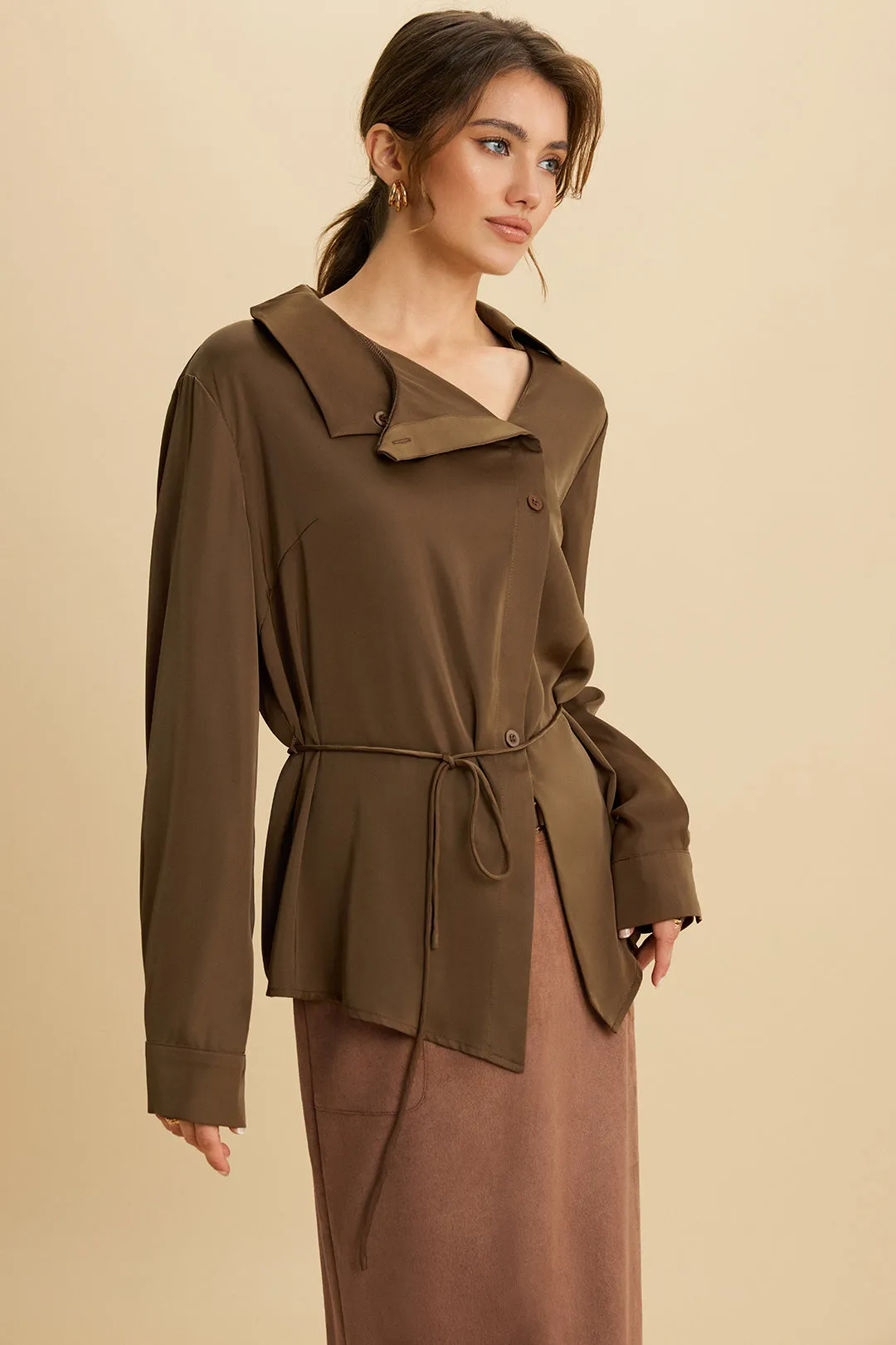 Satin Asymmetrical Neck Belted Long-Sleeve Shirt sold by Micas
