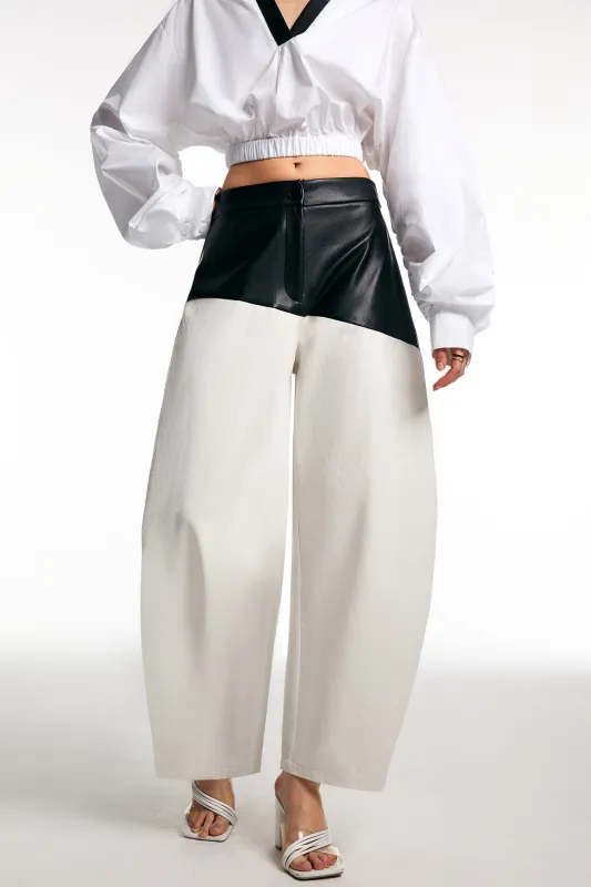 Faux Leather Patchwork Barrel Trousers sold by Micas