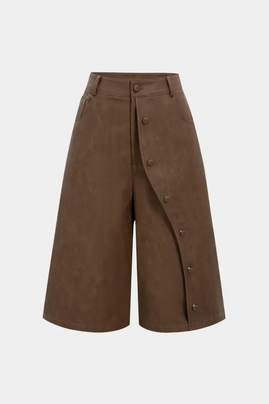Faux Leather Asymmetrical Button High Waist Shorts sold by Micas