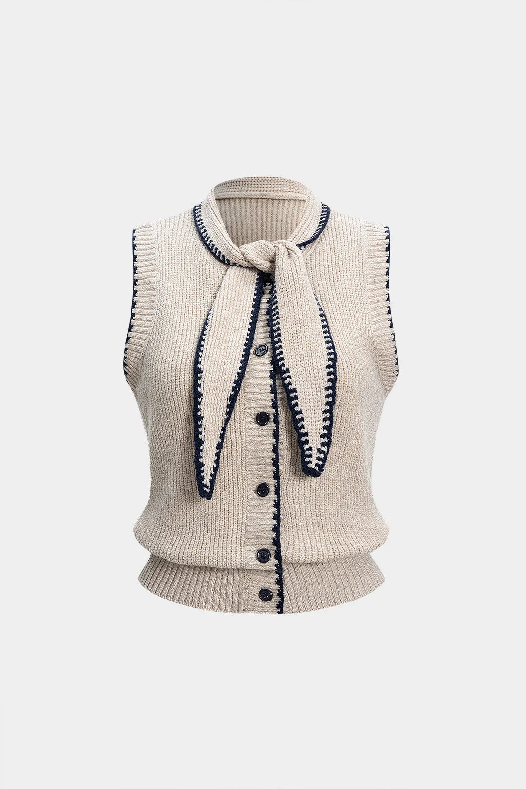 Knit Bow Button Vest sold by Micas