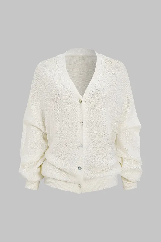 Knit V-Neck Button Long-Sleeve Top sold by Micas