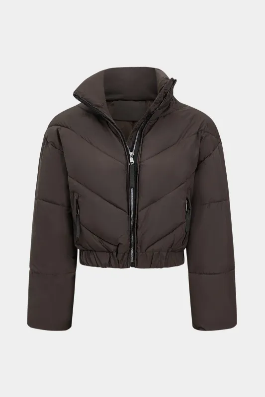 Solid Zipper Puffer sold by Micas