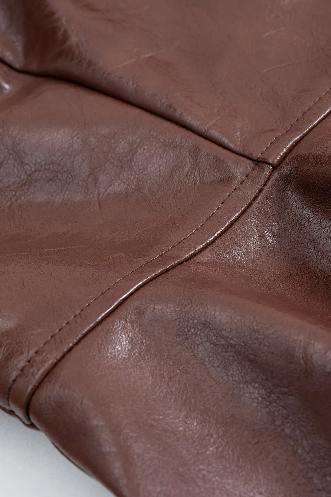 Faux Leather Asymmetrical Irregular Hem Bell Sleeve Jacket sold by Micas product image thumbnail 4