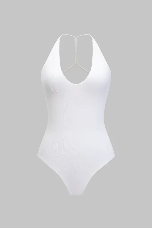 Grundlæggende ribben V-hals ærmeløs bodysuit sold by Micas
