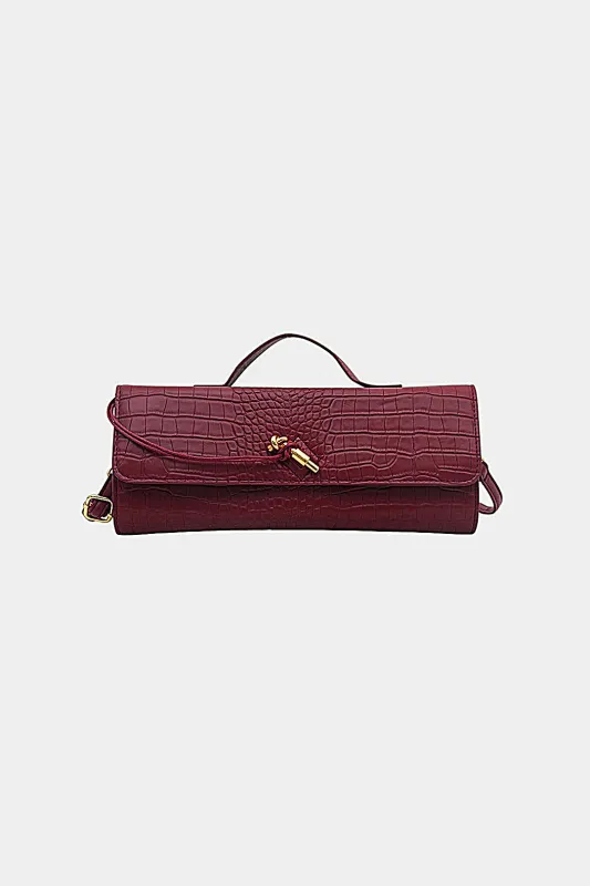 Crocodile Pattern Metallic Lock Clutch Bag sold by Micas