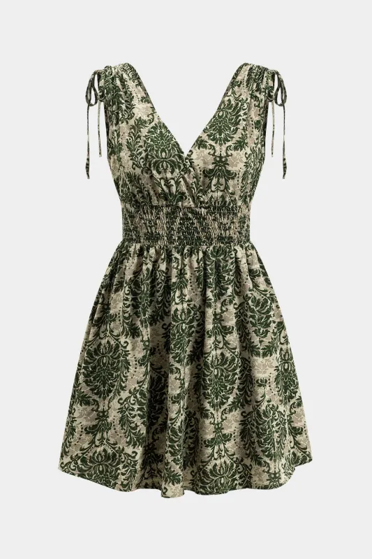 Bohemian Palm Leaf Print V-Neck Smocked Tie-Up Mini Dress made by Micas