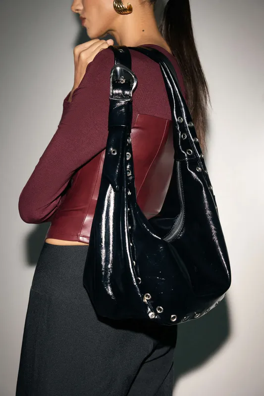 Leather Studded Cross-Body Bag sold by Micas