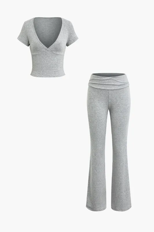 Low V-Neck Short Sleeve Top And High Waist Pants Set sold by Micas