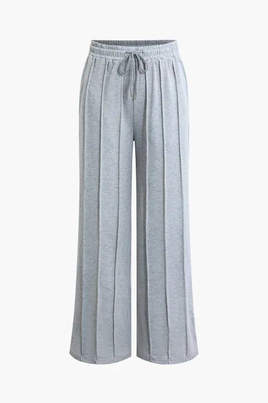 Solid Pleated Drawstring Pants sold by Micas