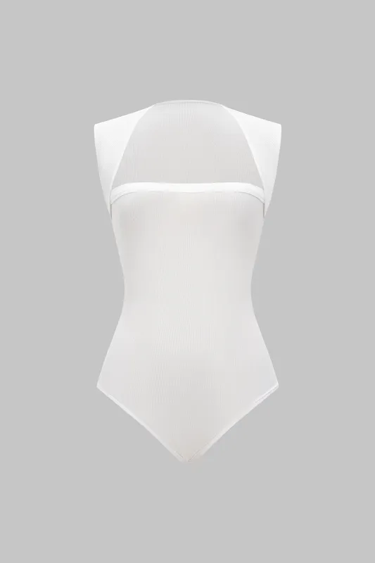 Solid Ribbed Short Sleeve Bodysuit sold by Micas