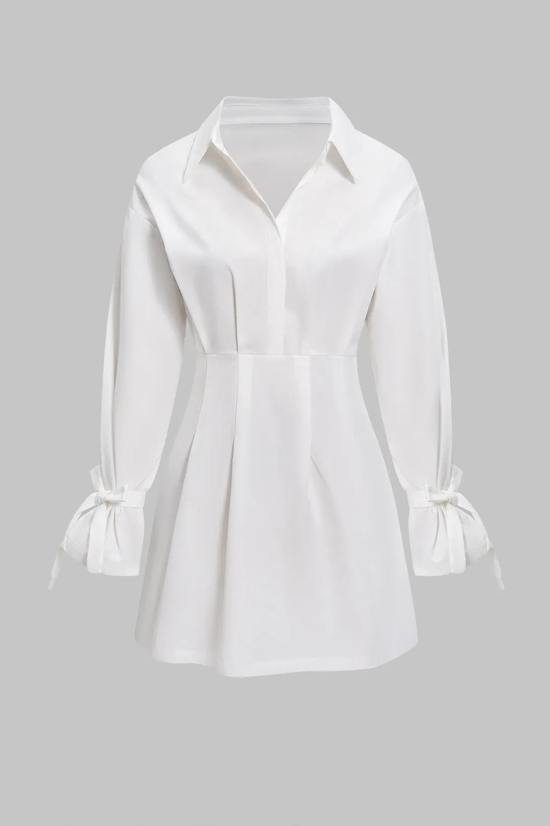 Button Pleated Bow Long Sleeve Mini Dress sold by Micas