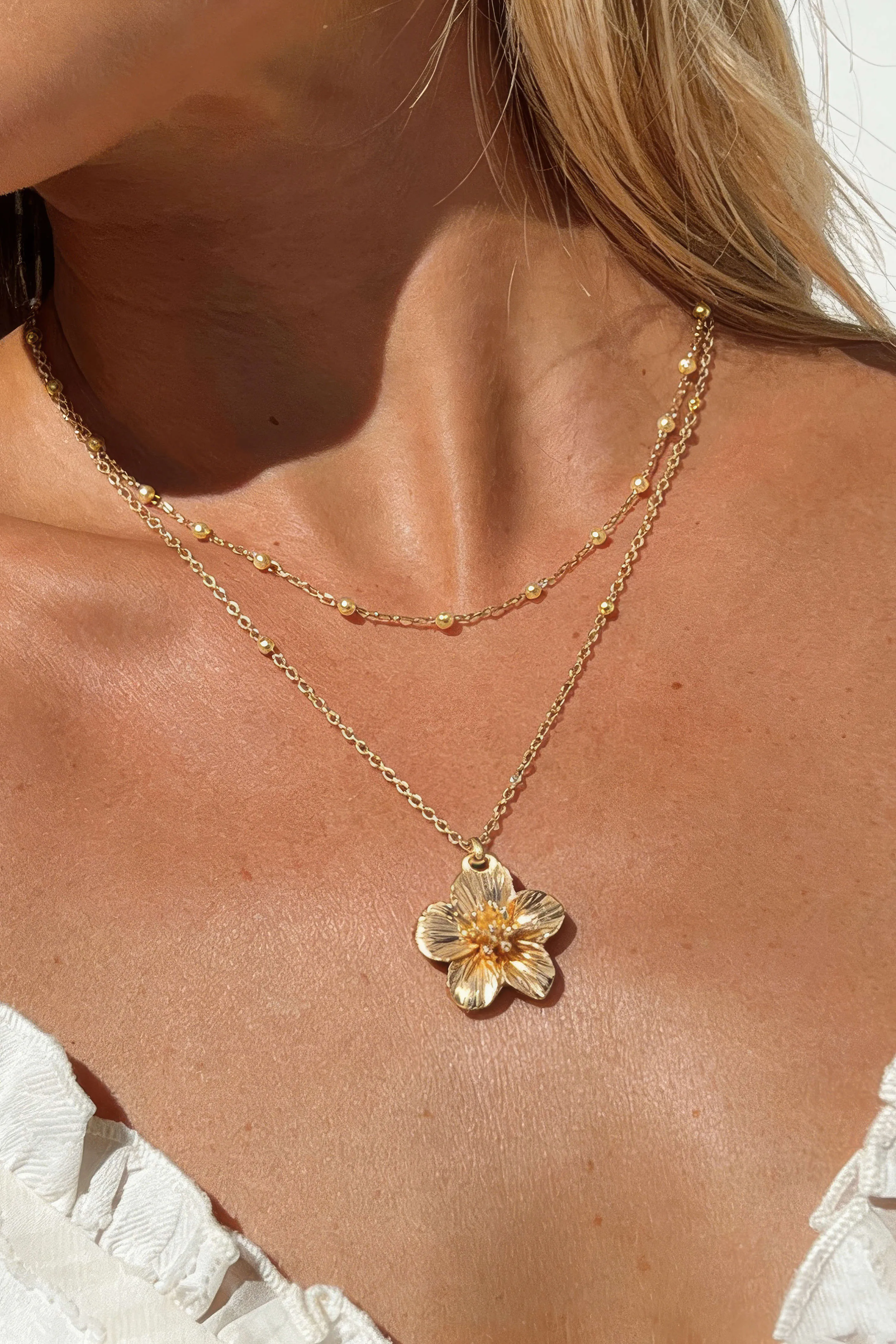 Metal Flower Necklace sold by Micas