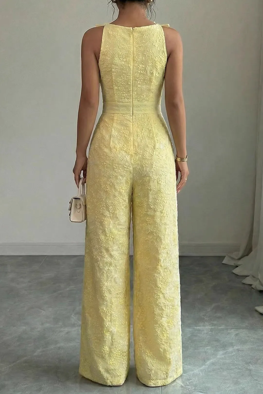 Foral Textured Round Neck Bow Sleeveless Jumpsuit sold by Micas product image thumbnail 3