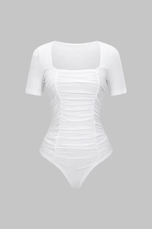 Solid Ruched Short-Sleeve Bodysuit made by Micas