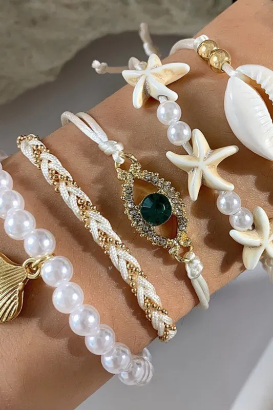 Shell And Pearl Handwoven Bohemian Bracelet sold by Micas