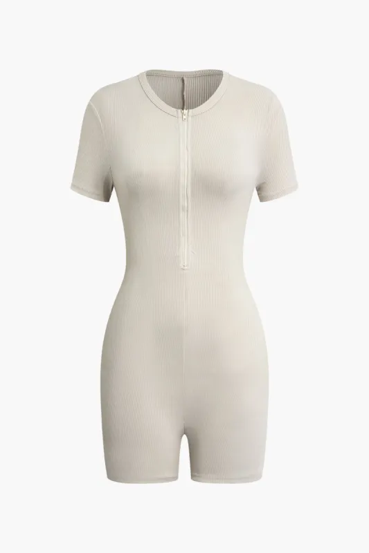 Solid Zipper Romper sold by Micas
