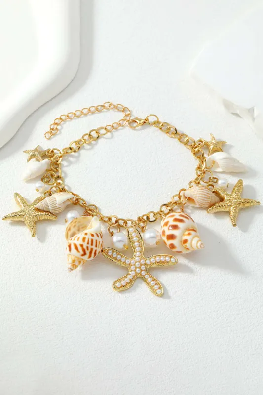 Seashell And Starfish Charm Bracelet sold by Micas