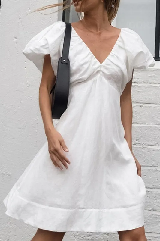 Solid Puff V-neck Mini Dress sold by Micas