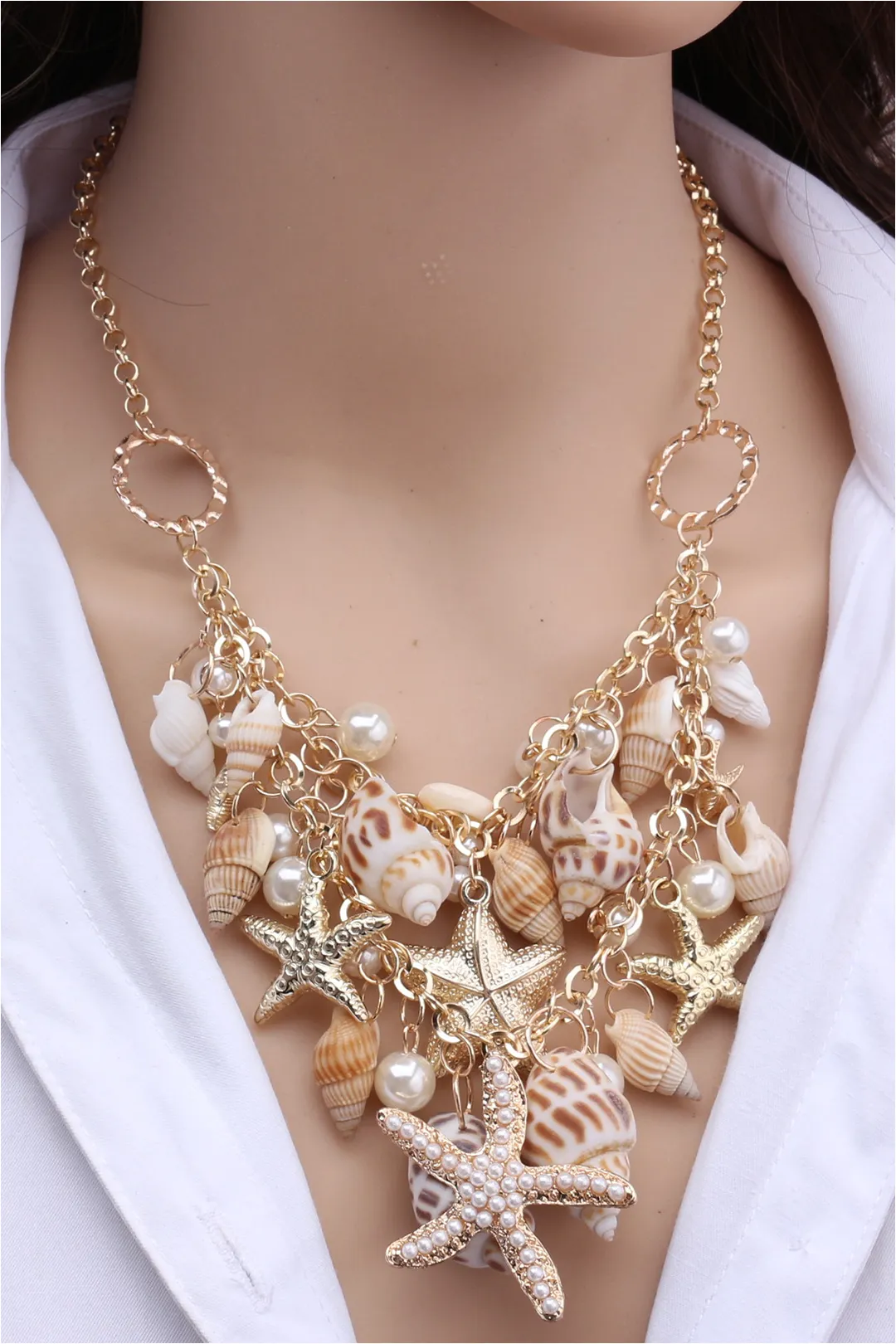 Seashell And Starfish Charm Necklace sold by Micas