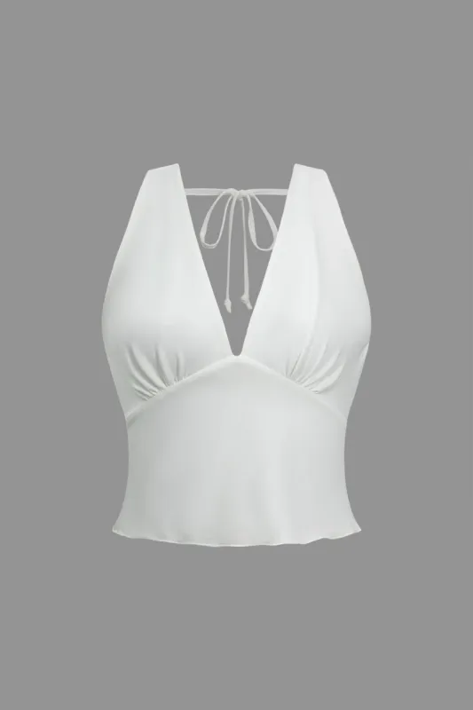 Solid rygfri bindetank top sold by Micas