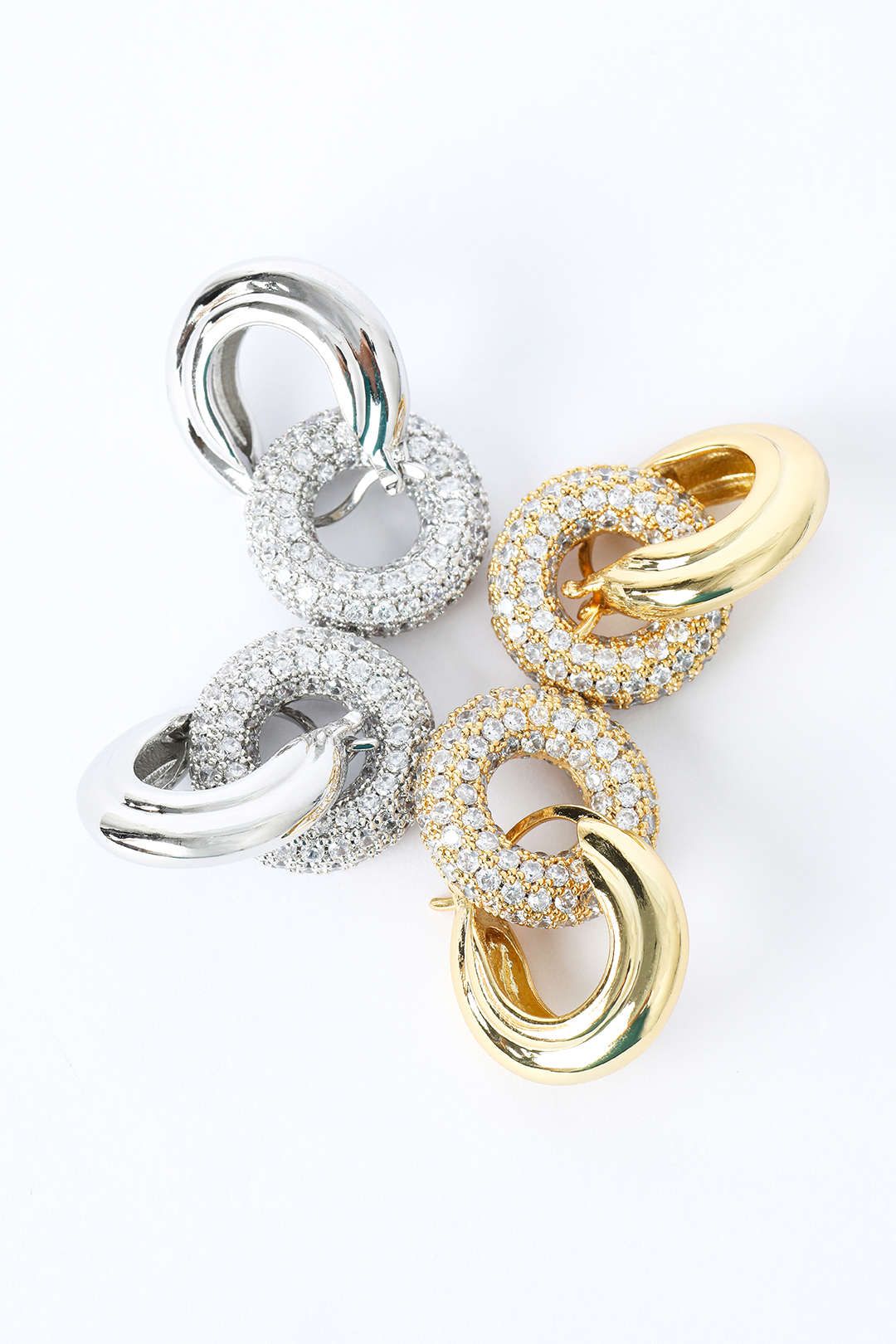 Pave Interlock Hoop Earrings sold by Micas product image thumbnail 6