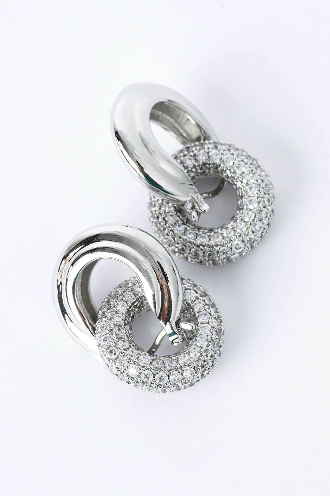 Pave Interlock Hoop Earrings sold by Micas