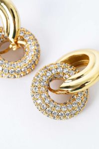 Pave Interlock Hoop Earrings sold by Micas