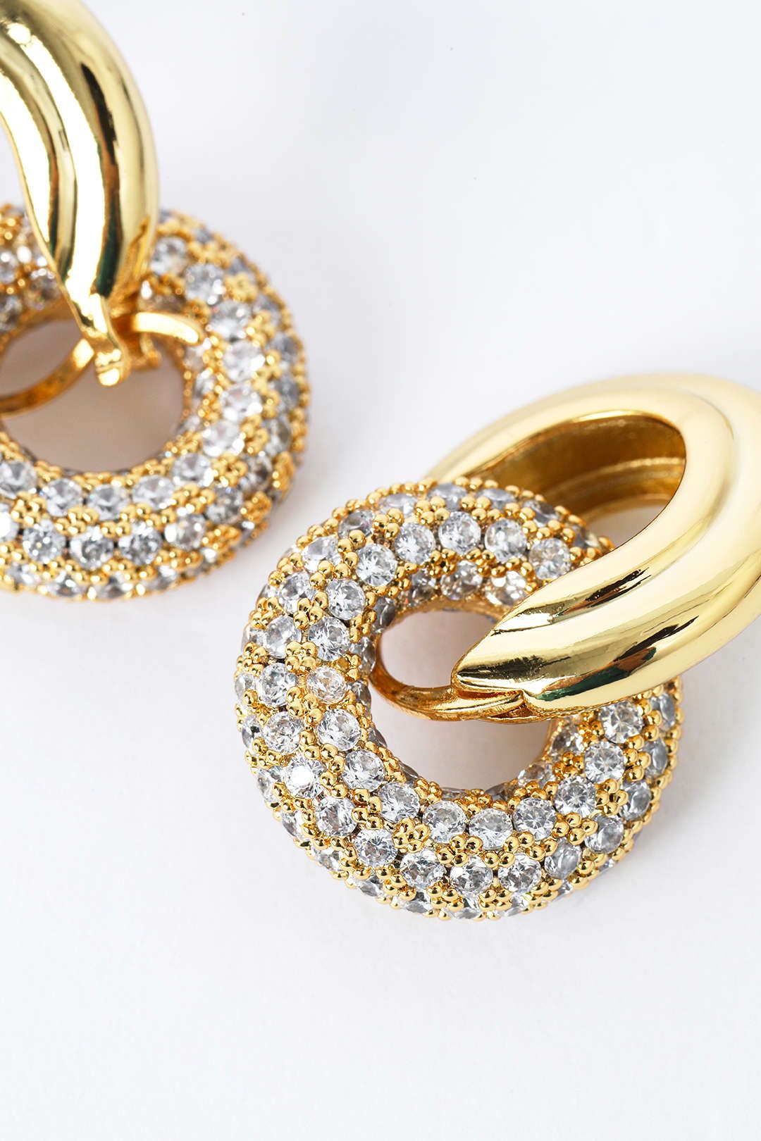 Pave Interlock Hoop Earrings sold by Micas product image thumbnail 5