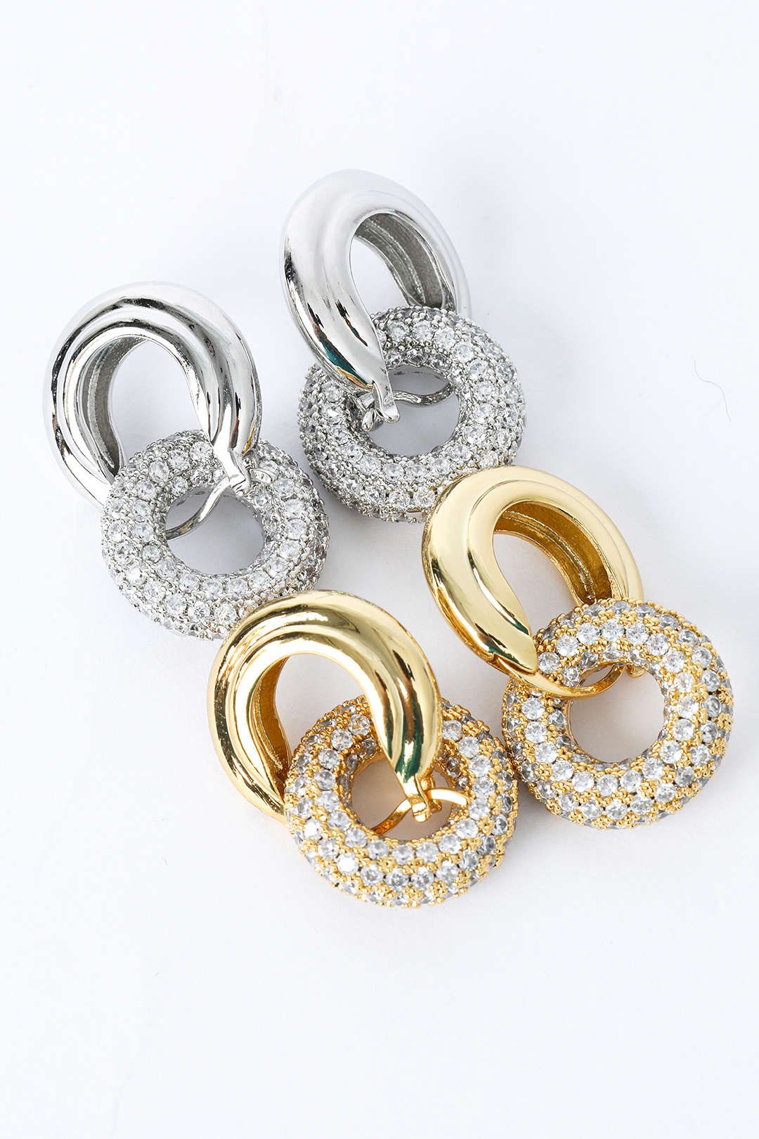 Pave Interlock Hoop Earrings sold by Micas product image thumbnail 3