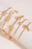 Shell Starfish Pearl Layered Armbånd sold by Micas