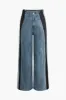 Kontrast jeans med brede ben sold by Micas