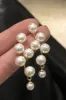 Pearl Drop Earrings sold by Micas