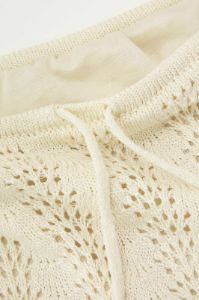 Openwork Knit Ruffle Mini Skirt sold by Micas
