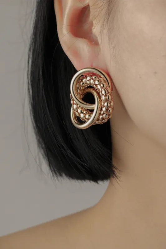 Interlocking Hoop Earrings sold by Micas