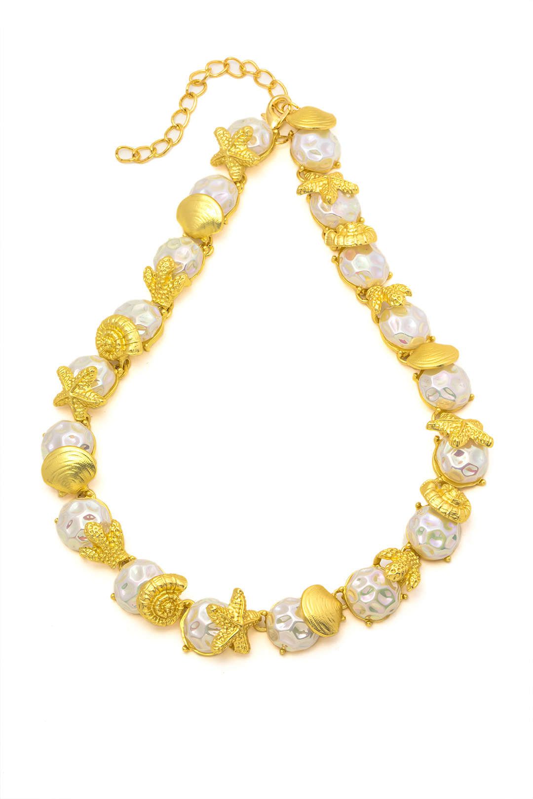 Gold Conch & Pearl Necklace sold by Micas