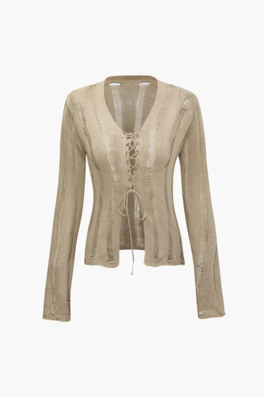 Tie Front Ripped Knit Long Sleeve Top sold by Micas