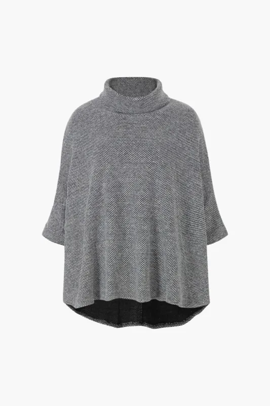 Oversized Batwing Sleeve Top sold by Micas