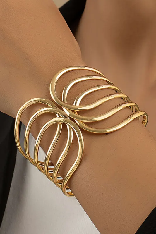 Criss Cross Arm Cuff sold by Micas