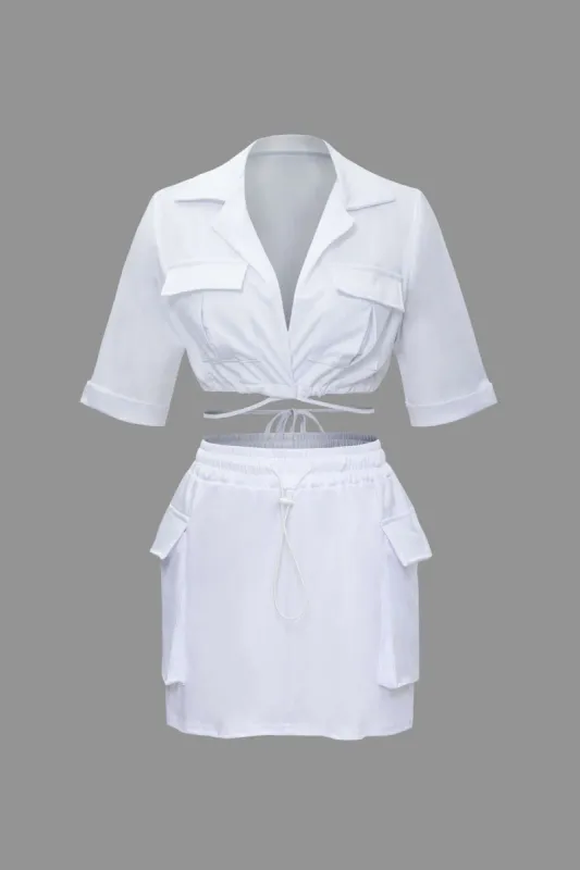 Flap Pocket Tie Back Crop Shirt And Elastic Waist Cargo Mini Skirt Set sold by Micas
